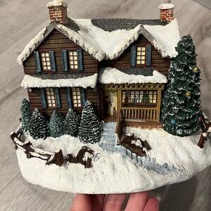 Snowy Holiday Village House with Festive Trees